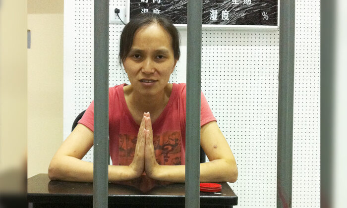 Chen Yinghua unlawfully detained at the Nanjing Detention Center in China for refusing to give up her spiritual faith in Falun Gong in July 2013. (Courtesy of Chen Yinghua)