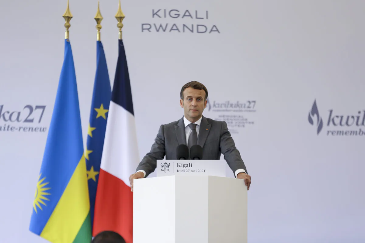 French President Emmanuel Macron speaks after signing the visitor's book at the genocide memorial site in the capital Kigali, Rwanda, on May 27, 2021. (Muhizi Olivier/AP Photo)