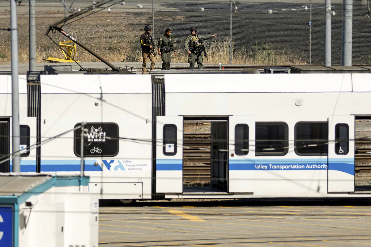 Law enforcement officers respond to the scene of a shooting at a Santa Clara Valley Transportation Authority (VTA) facility in San Jose, Calif., on May 26, 2021. (Noah Berger/AP Photo)
