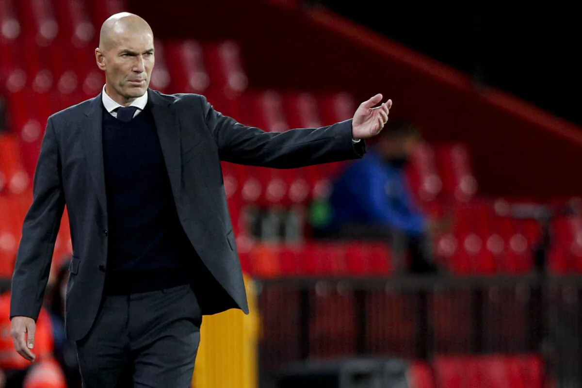 Real Madrid's head coach Zinedine Zidane gestures during the Spanish La Liga soccer match against Granada at Los Carmenes stadium in Granada, Spain, on May 13, 2021. (Fermin Rodriguez/AP Photo)