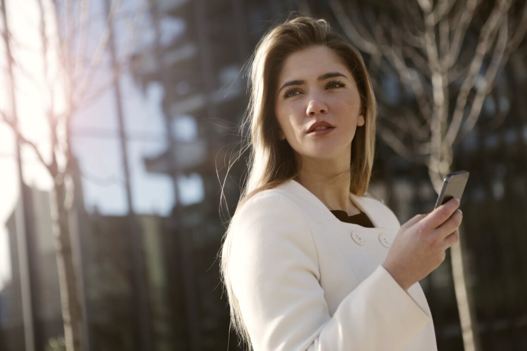 Simply holding your phone farther from your face and using the speak- erphone function can significantly lower your exposure.(Andrea Piacquadio/Pexels)