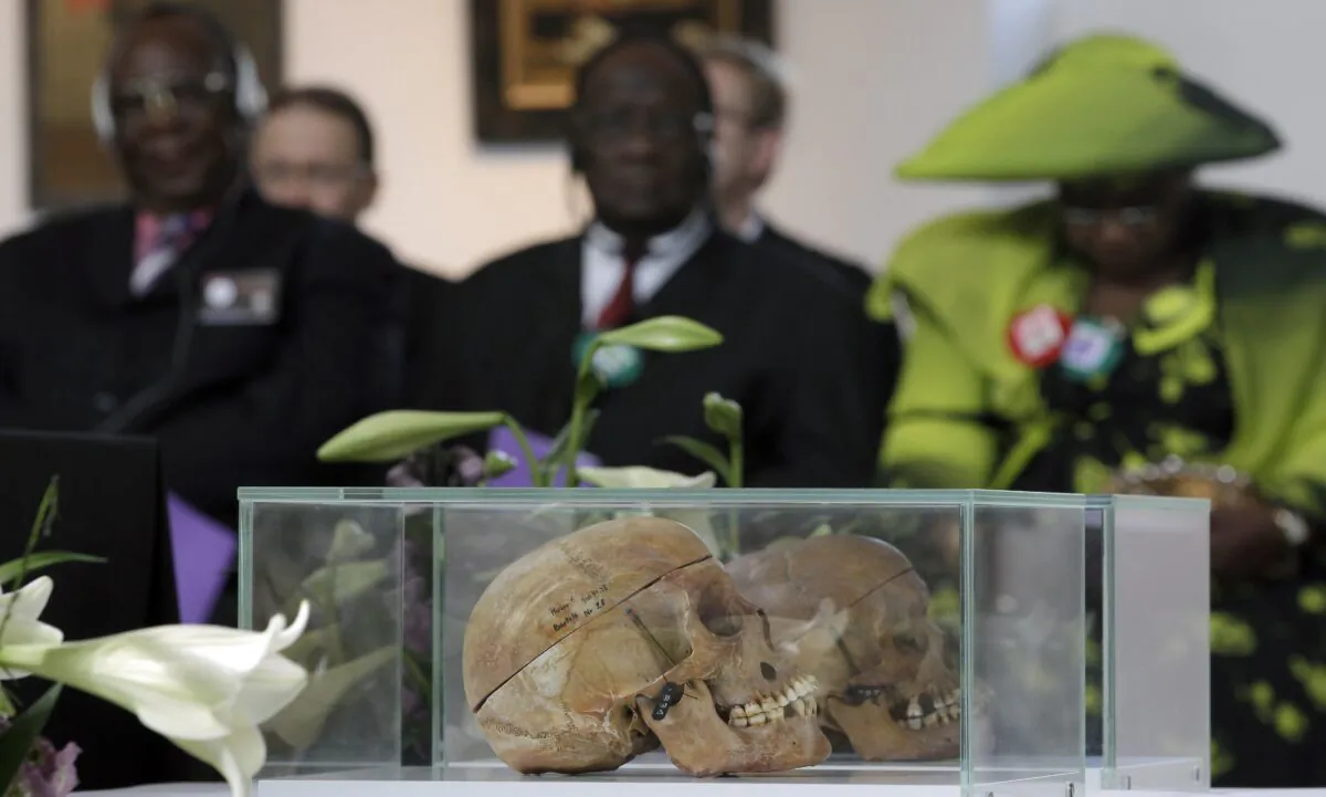 Skulls of Ovaherero and Nama people are displayed during a devotion attended by representatives of the tribes from Namibia in Berlin, Germany, on Sept. 29, 2011. (Michael Sohn/AP Photo)