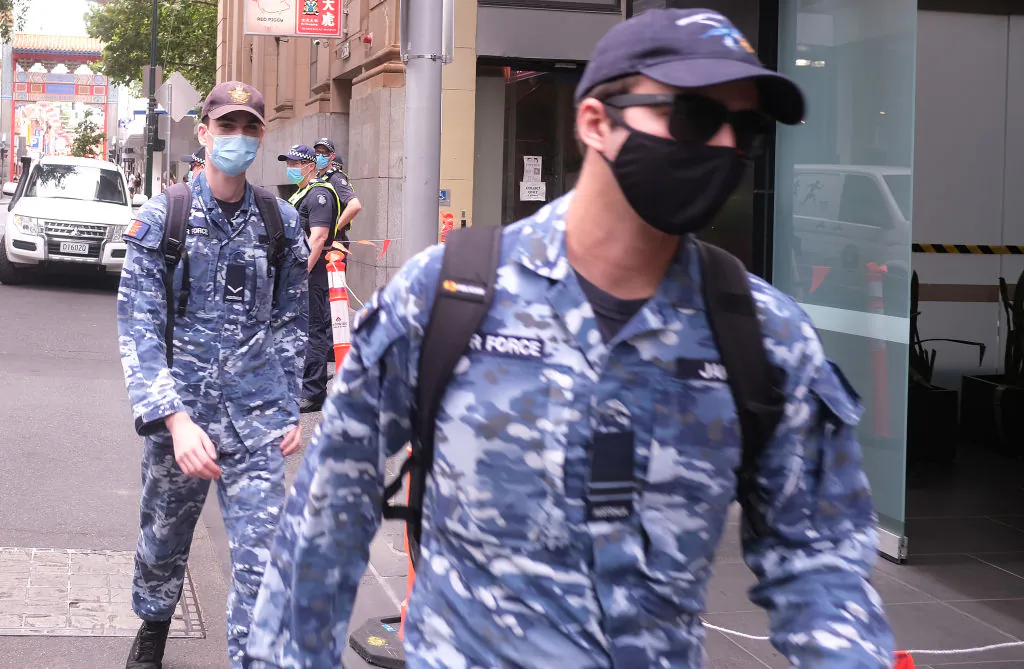 Australian Defence Force (ADF) personnel are seen arriving at the Pullman Hotel on February 11, 2021 in Melbourne, Australia. (Luis Ascui/Getty Images)