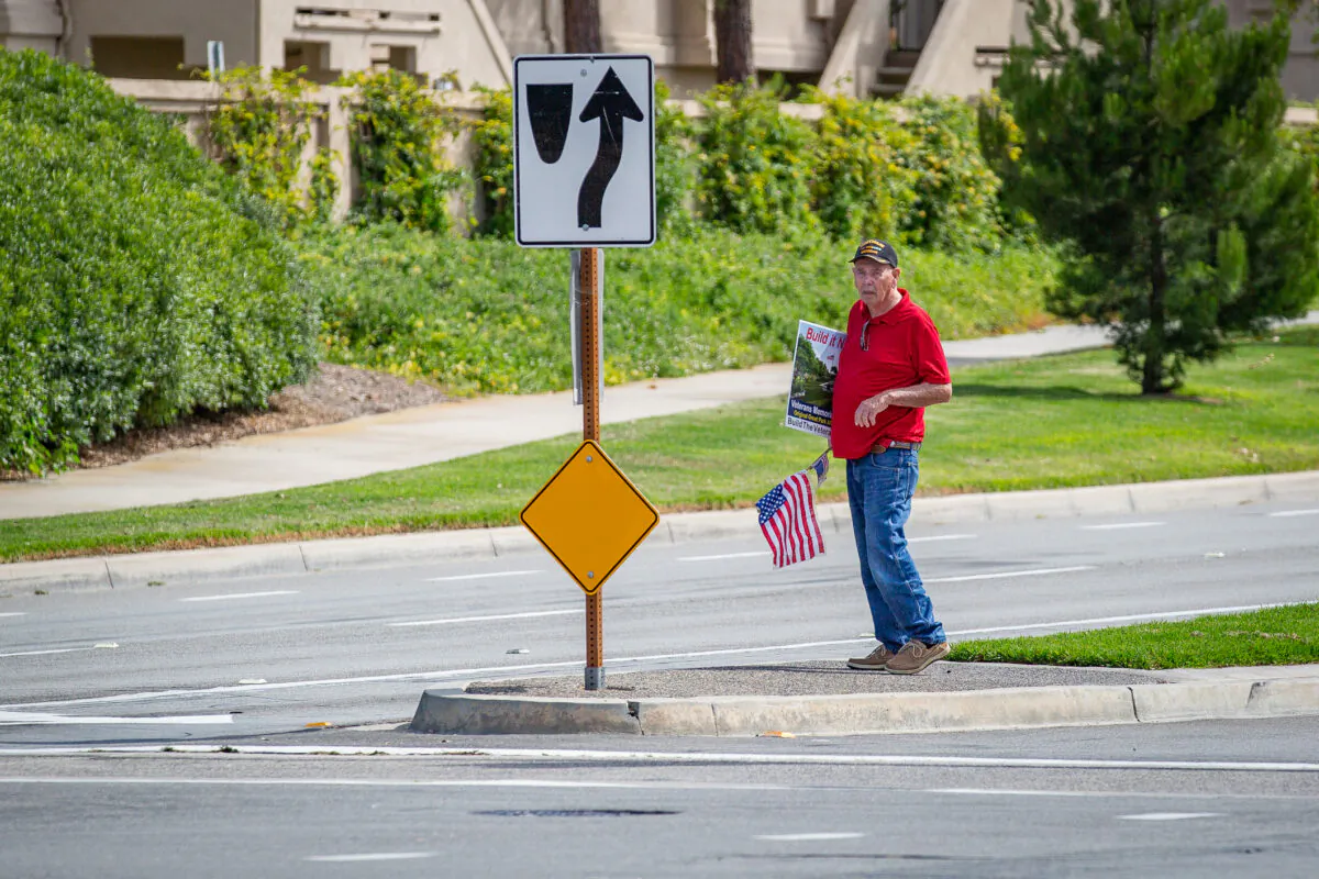Irvine residents gather to rally for various issues in front of Irvine City Hall in Irvine, Calif., on May 25, 2021. (John Fredricks/The Epoch Times)