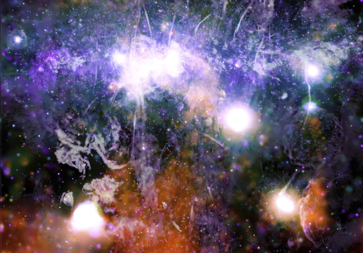 This false-color X-ray and radio frequency image made available by NASA on May 28, 2021 shows threads of superheated gas and magnetic fields at the center of the Milky Way galaxy. (NASA/CXC/UMass/Q.D. Wang, NRF/SARAO/MeerKAT via AP)