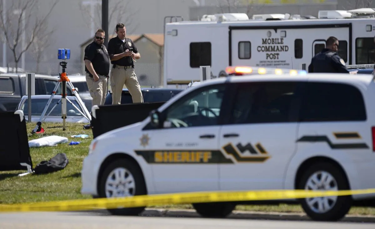 Police at the scene of a shooting at the Salt Lake County Sheriff's Office in Salt Lake City, Utah, on April 10, 2021. (Trent Nelson/file/The Salt Lake Tribune via AP)
