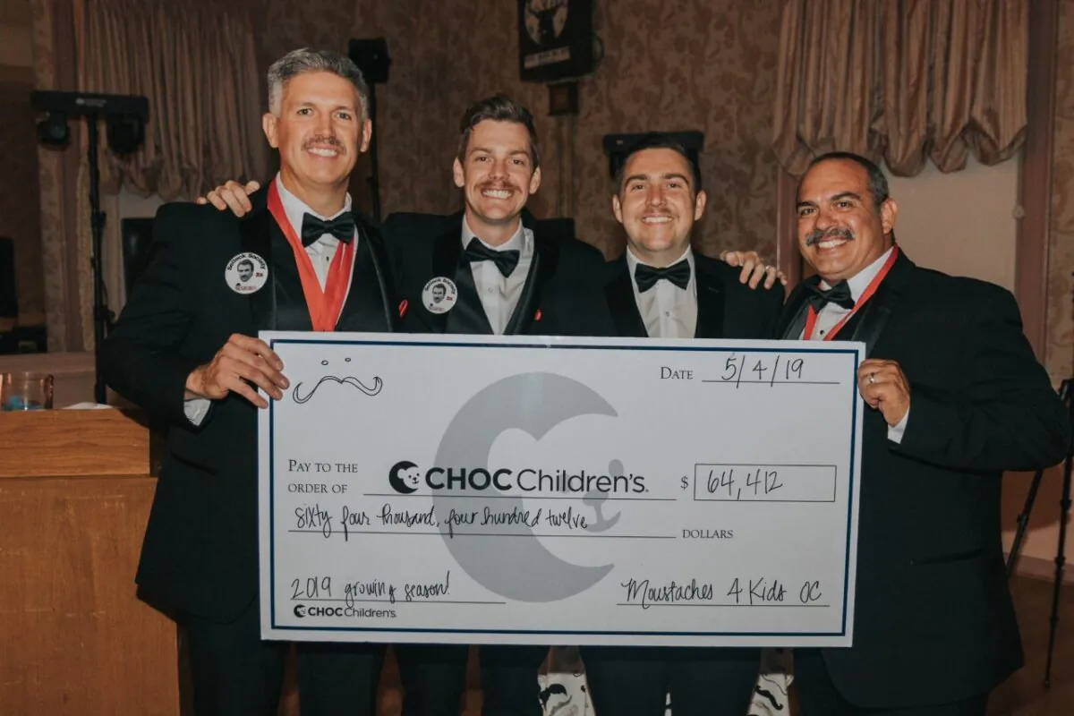 The Moustaches for Kids team includes (from left) President Cary Facer, Vice President Tim Kearns, and board members Michael Streavel and Gianfranco Masdea. (Photo courtesy of Jackie Kearns)