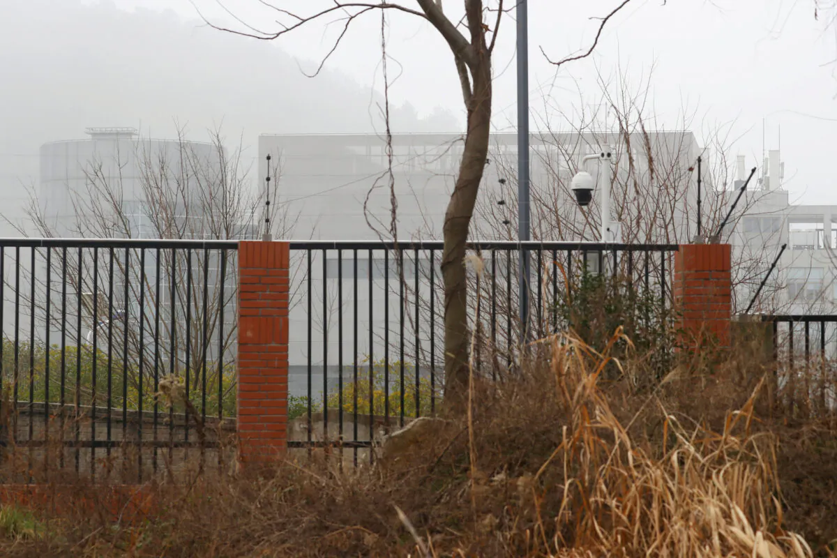 The P4 laboratory of Wuhan Institute of Virology is seen behind a fence during the visit by the World Health Organization (WHO) team tasked with investigating the origins of the coronavirus disease (COVID-19), in Wuhan, Hubei province, China, on Feb. 3, 2021. (Thomas Peter/Reuters)