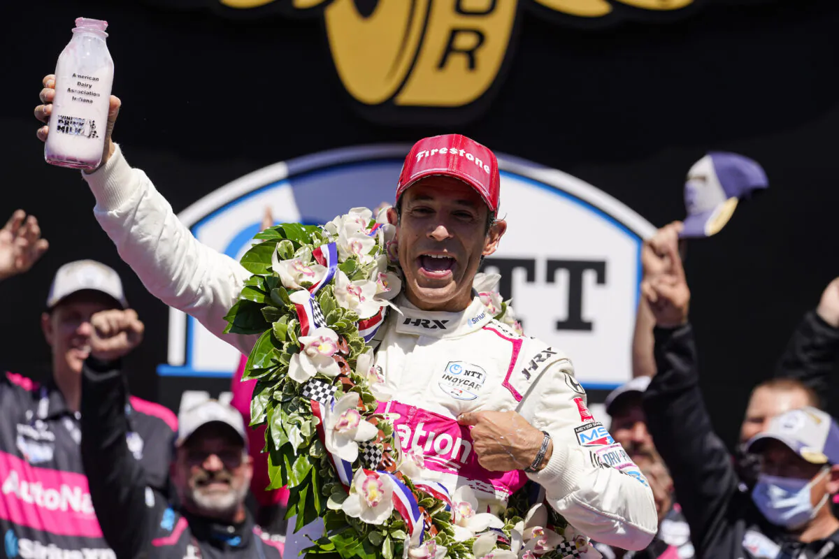 Helio Castroneves of Brazil celebrates after winning the Indianapolis 500 auto race at Indianapolis Motor Speedway in Indianapolis, on May 30, 2021. (Michael Conroy/AP Photo)