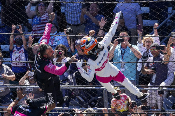 Helio Castroneves of Brazil celebrates