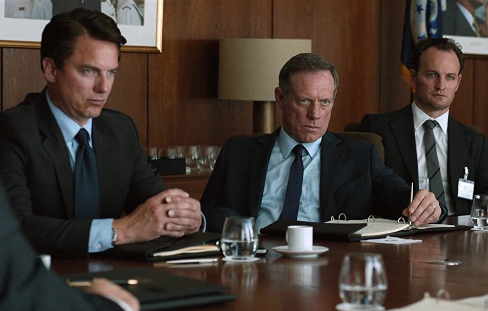 three men in suits at tabe in Zero Dark Thirty
