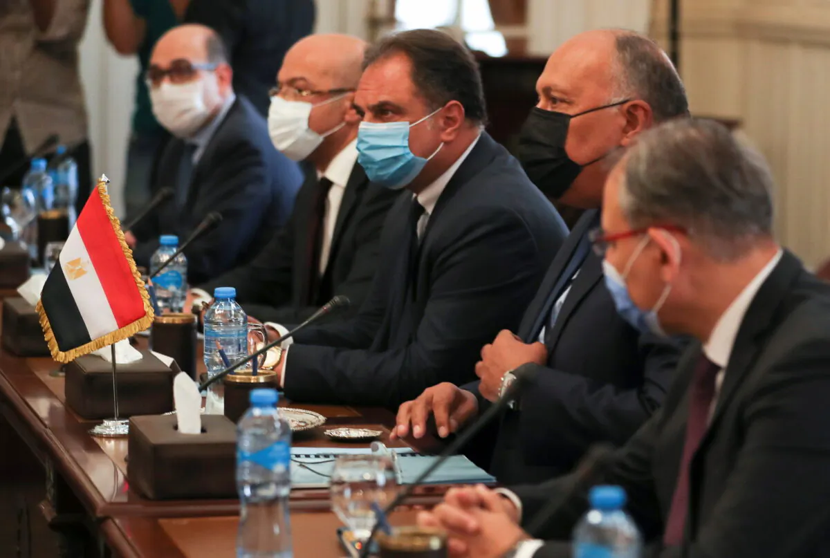 Egyptian Foreign Minister Sameh Shoukry meets with Israeli Foreign Minister Gabi Ashkenazi (not pictured) at Tahrir Palace in Cairo, Egypt, on May 30, 2021. (Mohamed Abd El Ghany/Reuters)