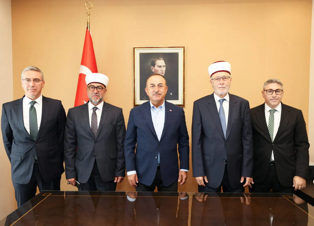 Turkish Foreign Minister Mevlut Cavusoglu meets with clerics and representatives of Muslim community in Komotini, Greece, on May 30, 2021. (Cem Ozdel/Turkish Foreign Ministry /Handout via Reuters)