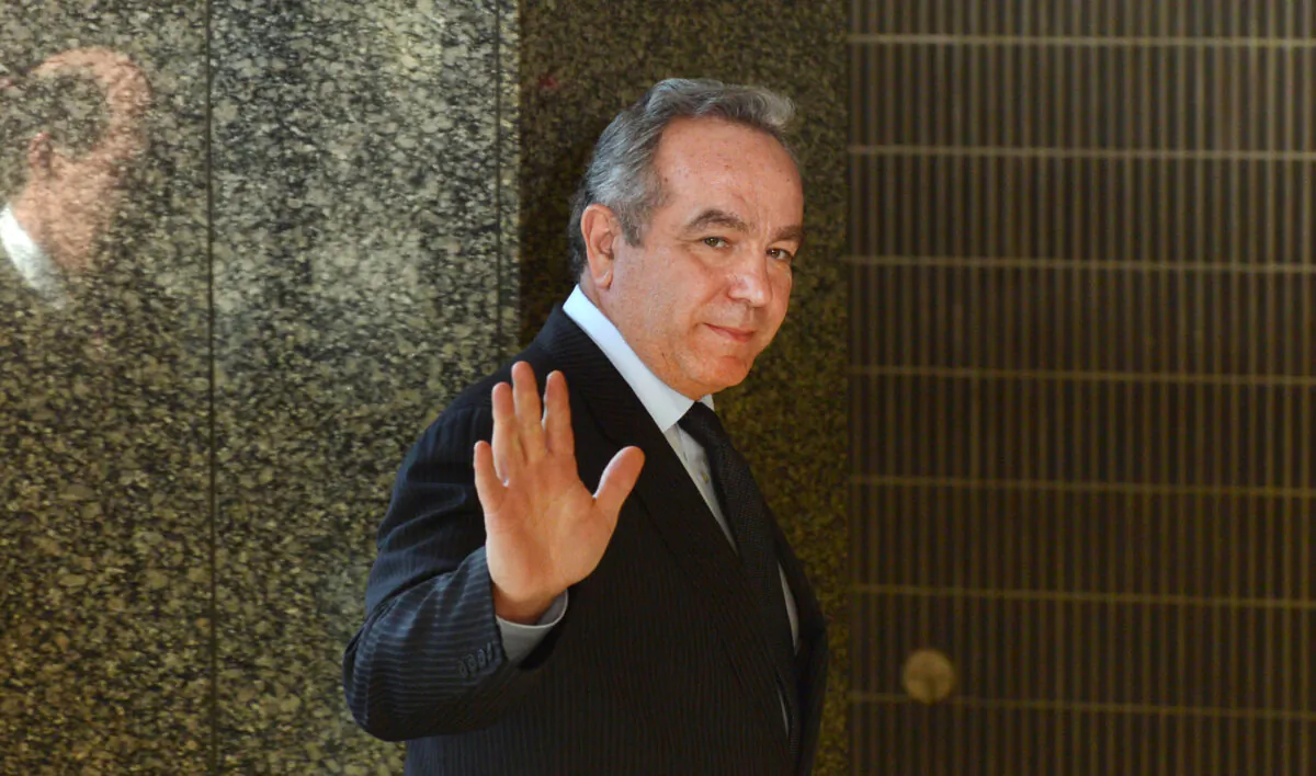 Then Assistant Secretary of State for East Asian and Pacific Affairs Kurt Campbell waves as he arrives at the Foreign Ministry to meet with Japanese officials in Tokyo on Jan. 17, 2013. (Kazuhiro Nogi/AFP via Getty Images)