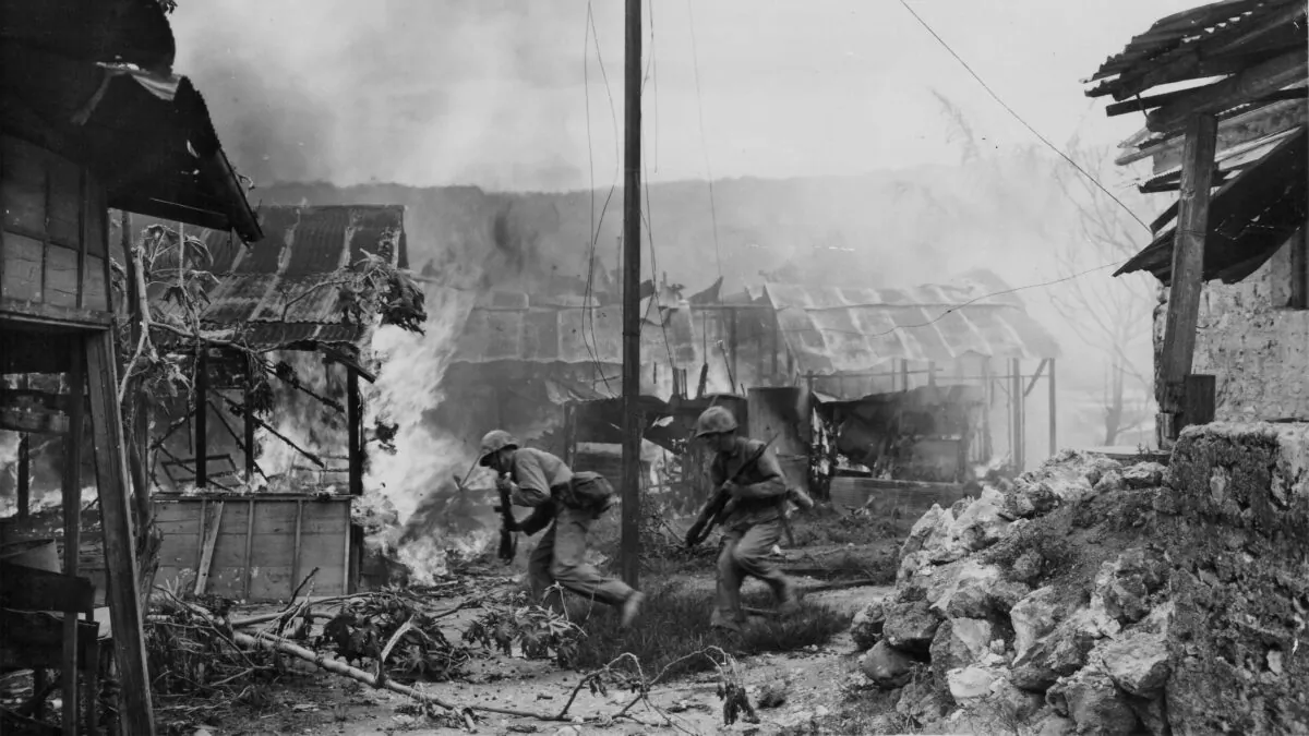 U.S. Marines moving positions during battle in Garapan, during the Pacific Campaign of World War II, on Saipan, circa 1943–1945. (U.S. Marine Corps/Getty Images)