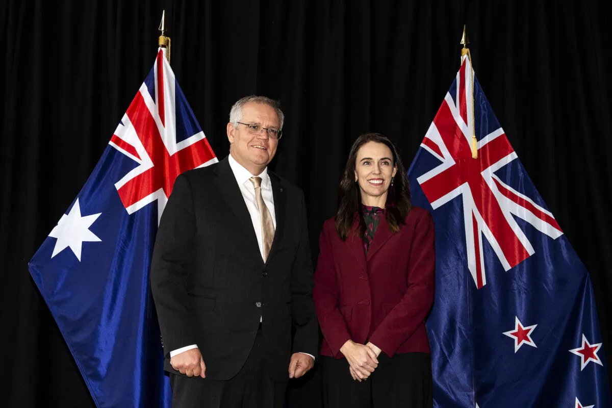 New Zealand Prime Minister Jacinda Ardern (R) poses for a photo with Australian Prime Minister Scott Morrison ahead of their annual talks in Queenstown, New Zealand, on May 31, 2021. (Joe Allison/Getty Images)