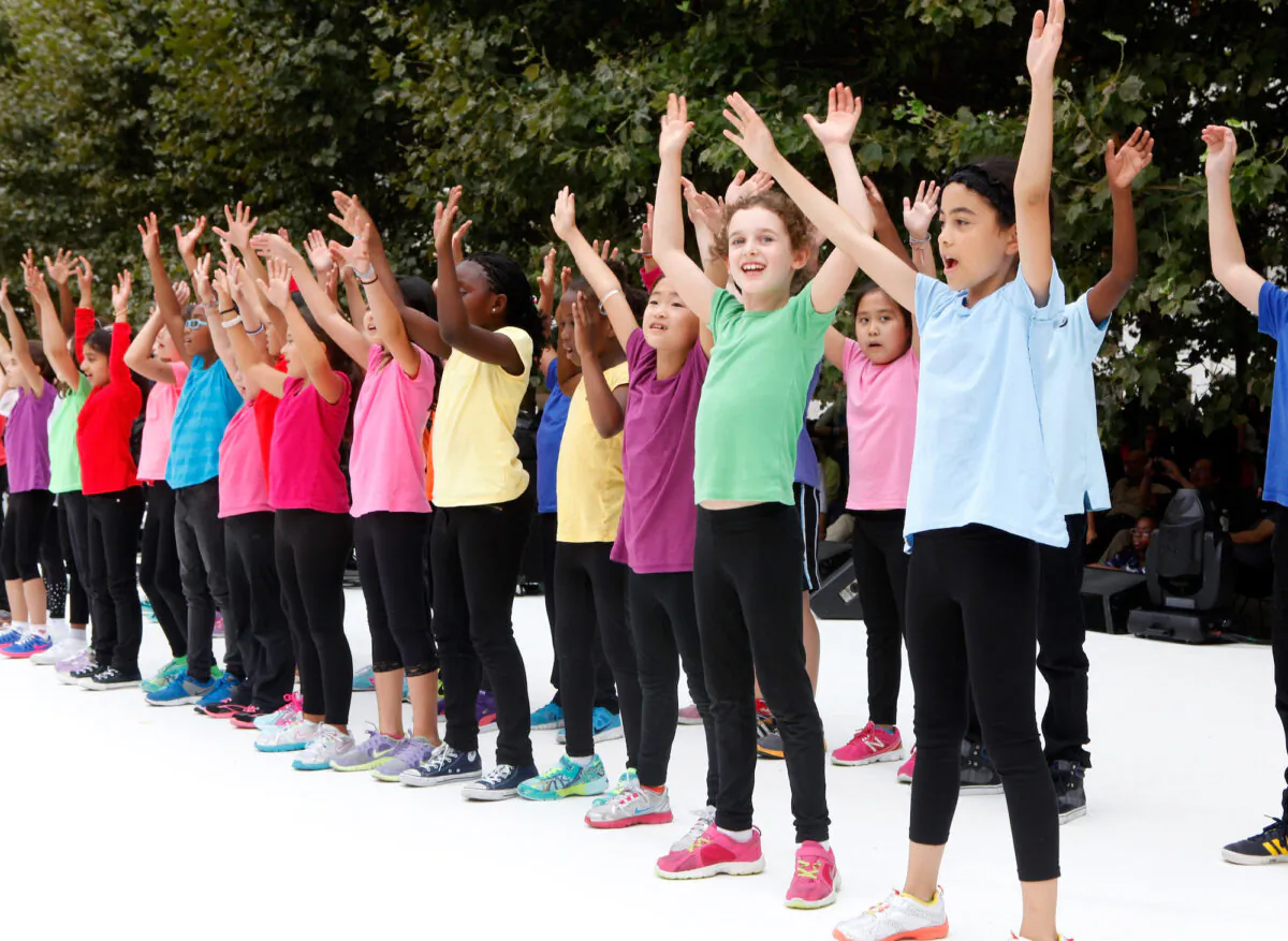 Students of Dalton School perform at Hearst Plaza, Lincoln Center in New York City on Sept. 21, 2014. (Thos Robinson/Getty Images for Shinnyo-en)