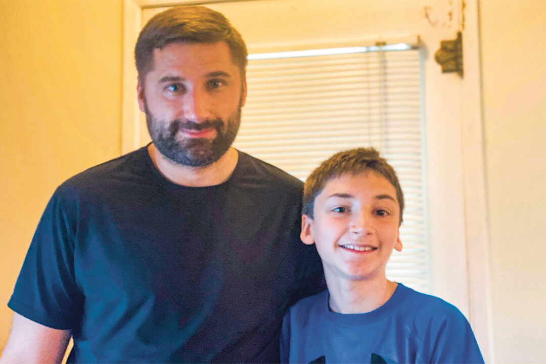 Joe McCrea with his son Joel on May 31, 2020. Joel's family believes prayer healed the 12-year-old's potentially life-threatening brain blood vessel disorder. (Courtesy of Joe Mc Crea)