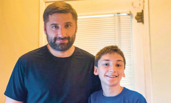 Joe McCrea with his son Joel on May 31, 2020. Joel's family believes prayer healed the 12-year-old's potentially life-threatening brain blood vessel disorder. (Courtesy of Joe Mc Crea)