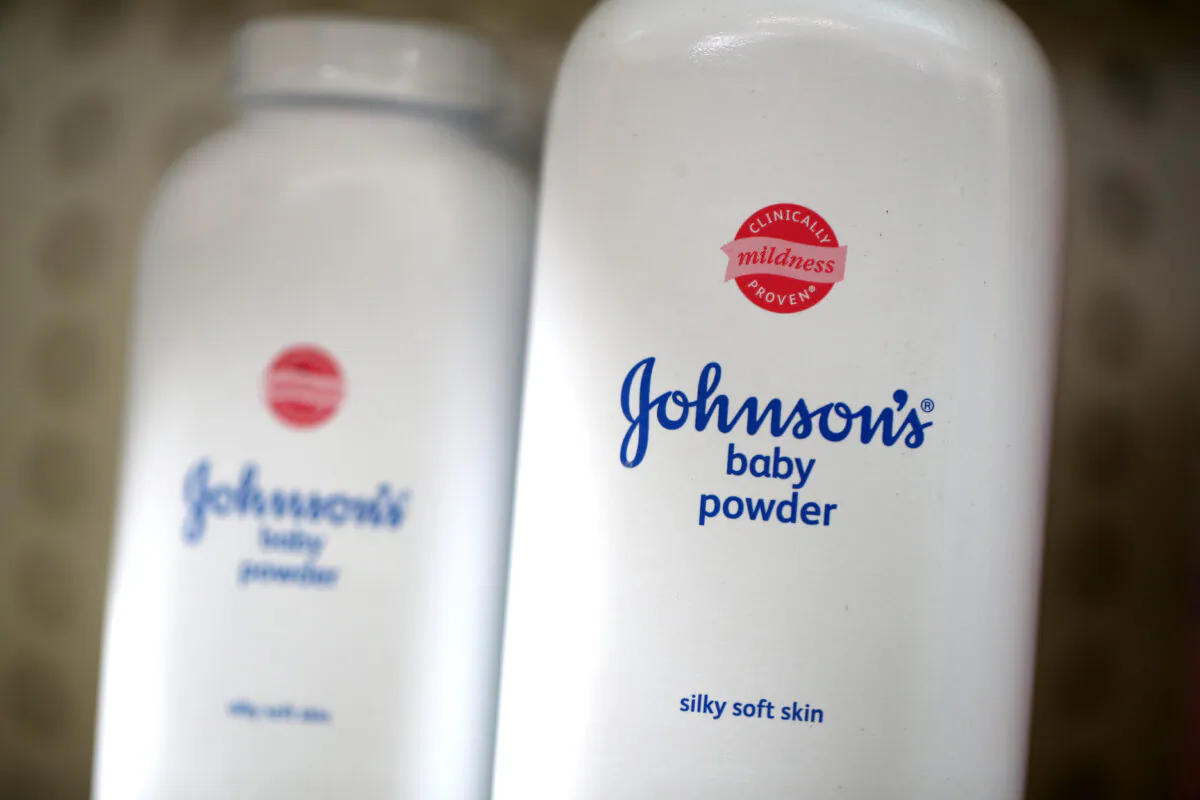 Containers of Johnson's baby powder made by Johnson and Johnson sits on a shelf at Jack's Drug Store in San Anselmo, California, on Oct. 18, 2019. (Justin Sullivan/Getty Images)