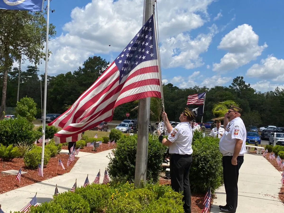 An American flag at VFW Post #10209 is lowered to half-staff in honor of America’s fallen on Memorial Day in Spring Hill, Fla., on May 31, 2021. (Patricia Tolson/The Epoch Times)