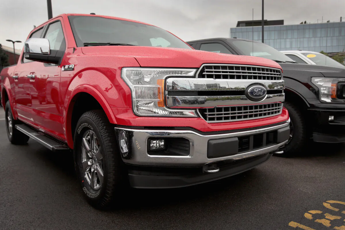 Ford F-150 pickup trucks at a dealership in Chicago on Sept. 6, 2018. (Scott Olson/Getty Images)