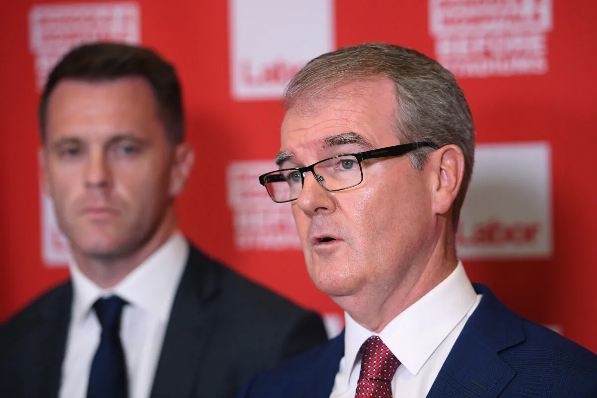 NSW Labor MP Michael Daley along with MP Chris Minns (left) address media in Sydney, Australia Jan. 31, 2019. (AAP Image/Dan Himbrechts) NO ARCHIVING