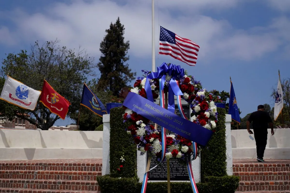 An alternate smaller American flag flies over the Los Angeles National Cemetery in Los Angeles, Calif., on May 31, 2021. (Damian Dovarganes/AP Photo)