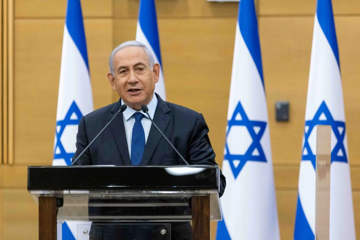 Israeli Prime Minister Benjamin Netanyahu delivers a political statement in the Knesset, in Jerusalem, Israel, on May 30, 2021. (Yonatan Sindel/Pool via Reuters)