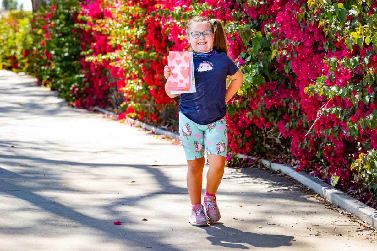8-year-old author Kiara "Kiwi" Smith in Brea, Calif., on May 24, 2021. (John Fredricks/The Epoch Times)