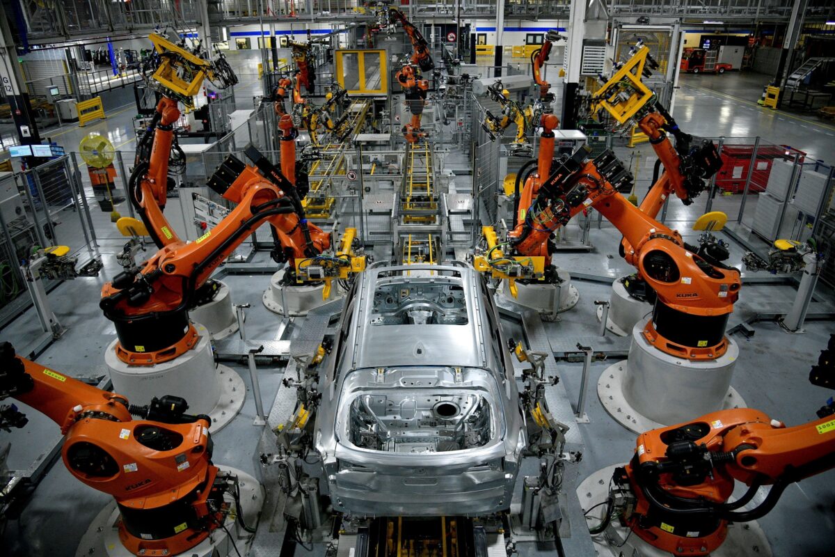 Autonomous robots assemble a Model X SUV at BMW's Greer manufacturing plant