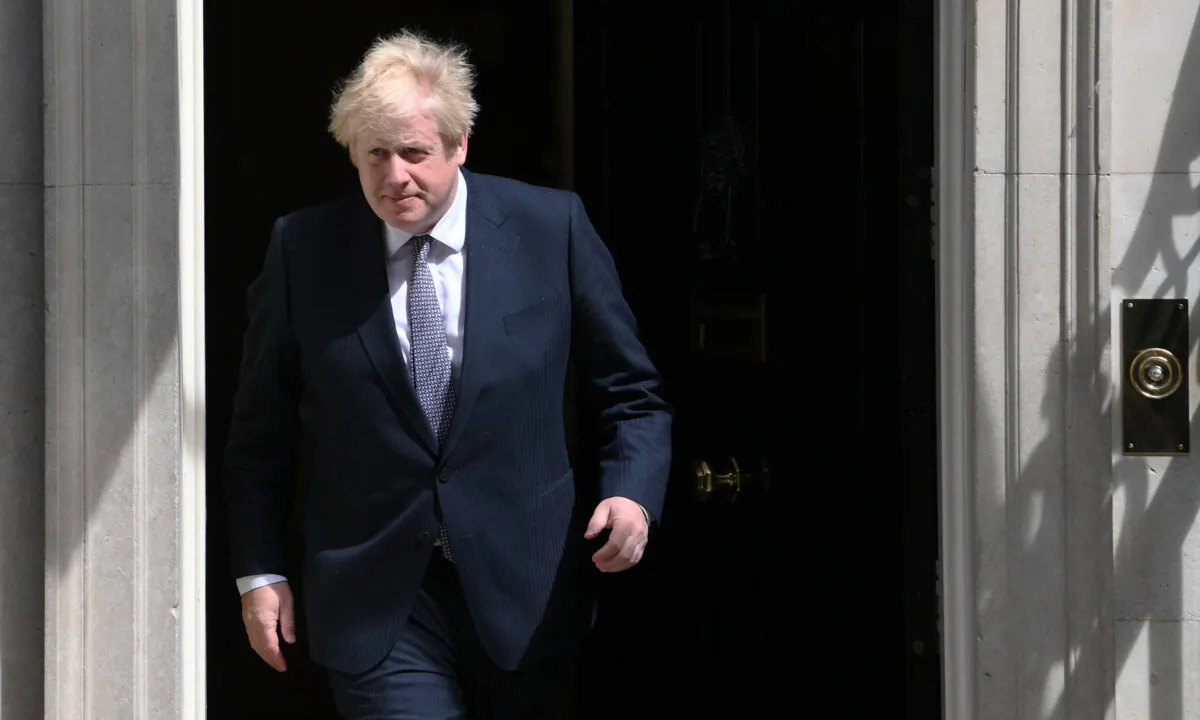 Prime Minister Boris Johnson exits 10 Downing Street in London on June 2, 2021. (Stefan Rousseau/PA)