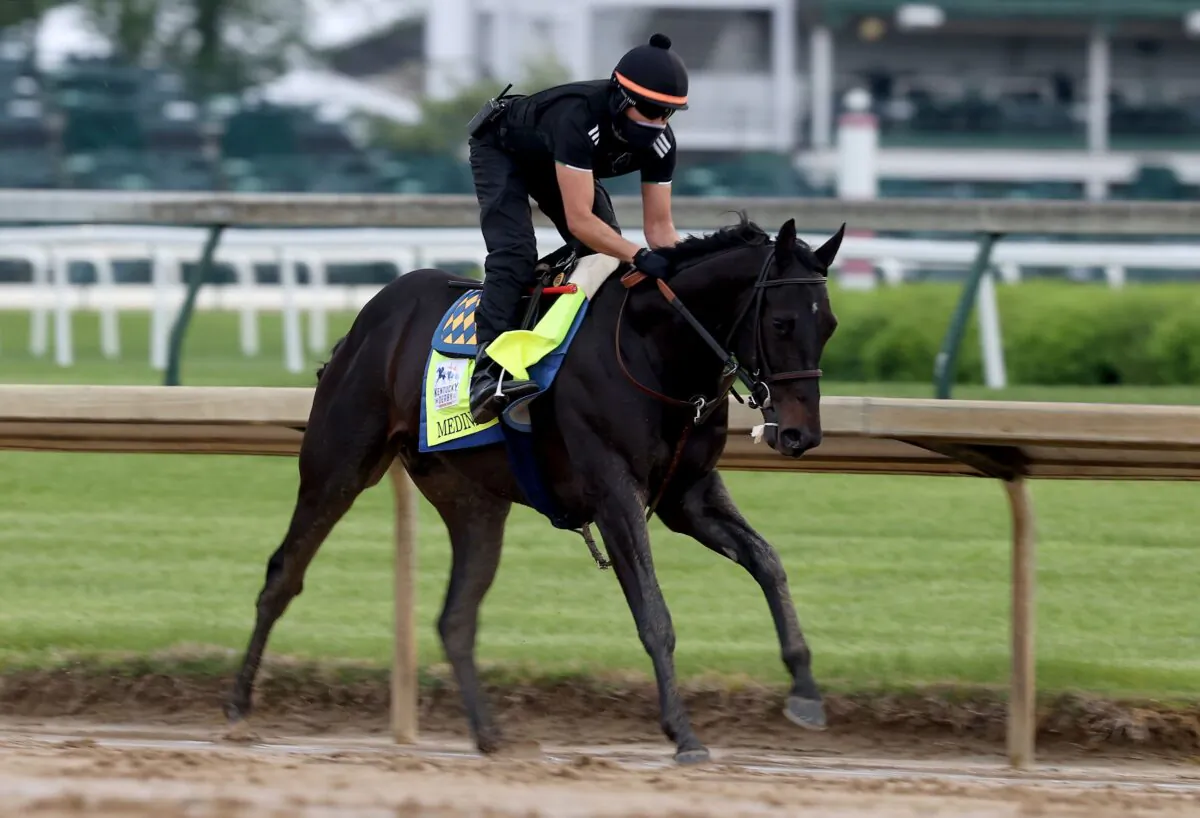 Medina Spirit runs on the track during the training for the Kentucky Derby at Churchill Downs in Louisville, Ky., on April 29, 2021. (Andy Lyons/Getty Images)