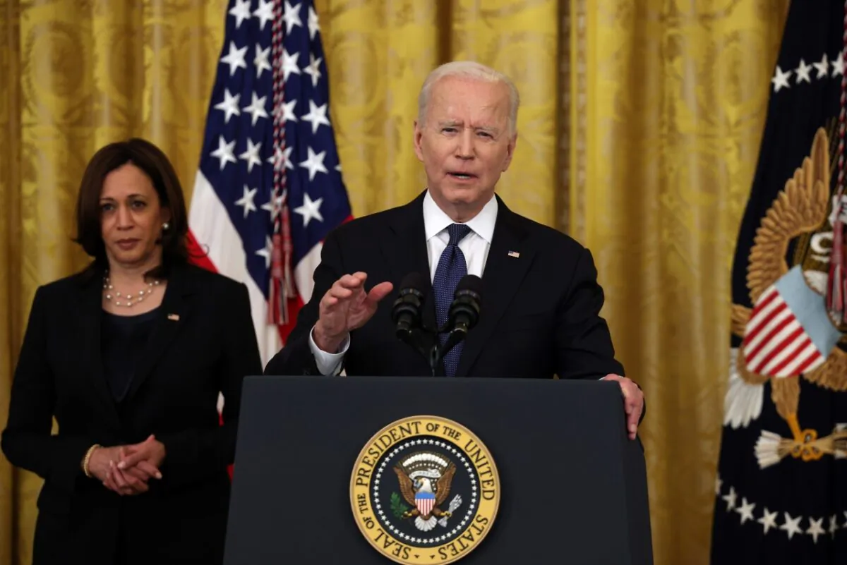 U.S. President Joe Biden gestures during his remarks, as Vice President Kamala Harris looks on, before a signing ceremony for the COVID-19 Hate Crimes Act in the East Room of the White House on May 20, 2021. (Anna Moneymaker/Getty Images).