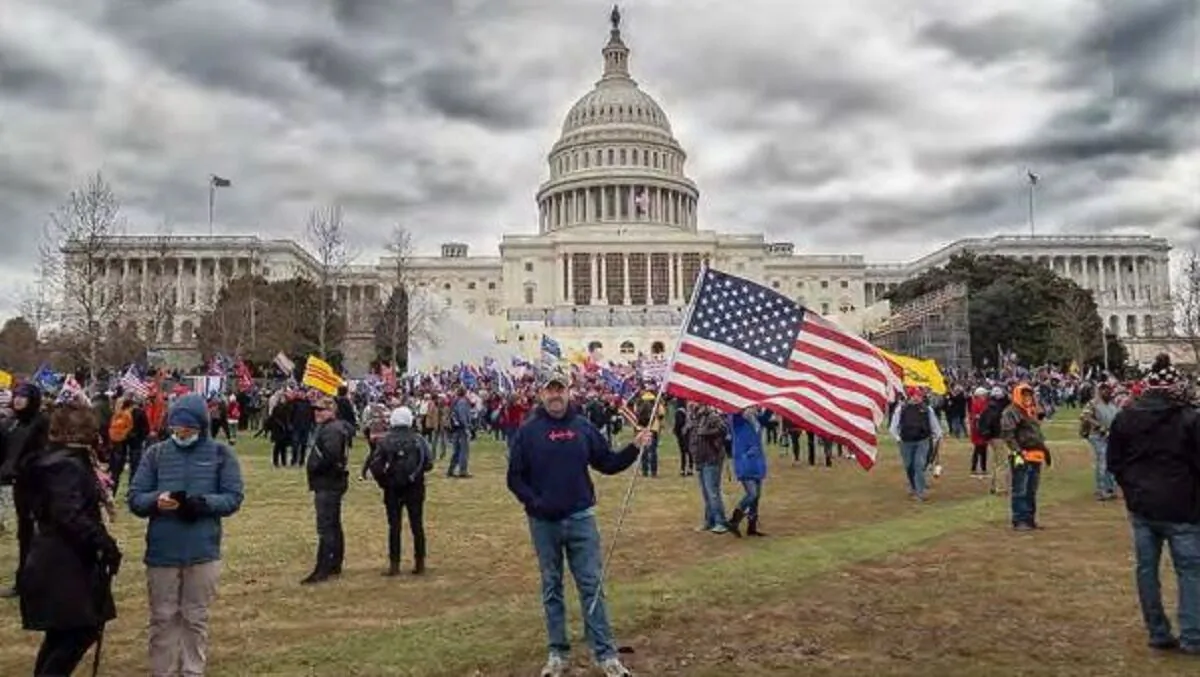 A man believed to be Christopher Kelly is seen posing in Washington on Jan. 6, 2021. (FBI)