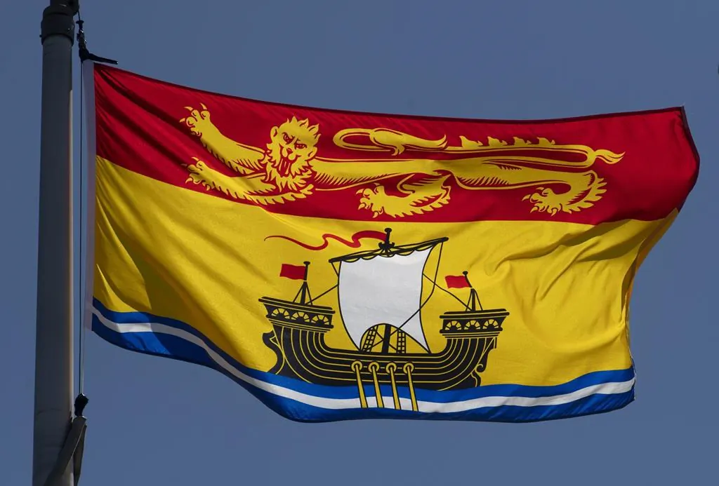 New Brunswick's provincial flag flies in Ottawa, on July 6, 2020. (The Canadian Press/Adrian Wyld)