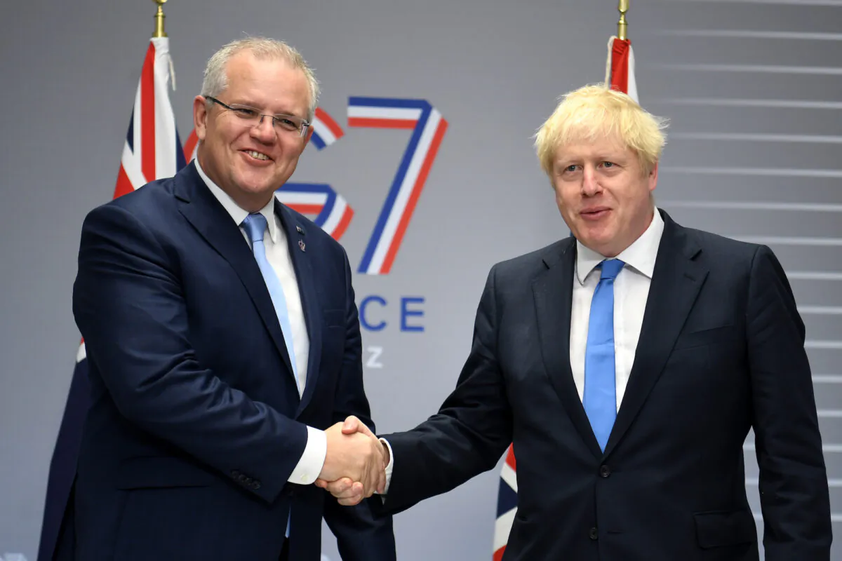 British Prime Minister Boris Johnson (R) meets Australian Prime Minister Scott Morrison (L) for their bilateral talks during the G7 Summit in Biarritz, France on August 24, 2019. (Neil Hall- Pool/Getty Images)