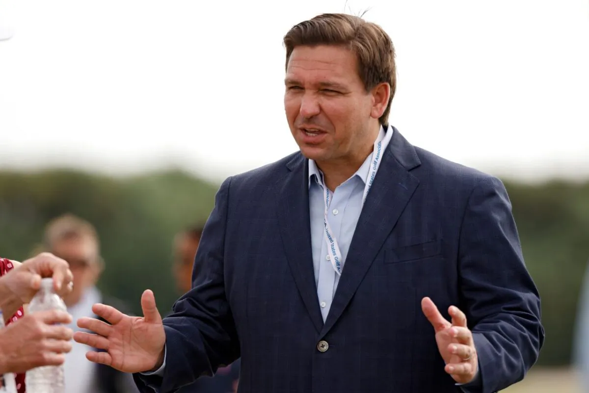 Florida governor Ron DeSantis meets with fans during Day One of The Walker Cup at Seminole Golf Club in Juno Beach, Fla., on May 8, 2021. (Cliff Hawkins/Getty Images)
