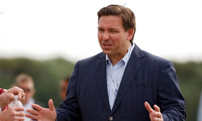 Florida governor Ron DeSantis meets with fans during Day One of The Walker Cup at Seminole Golf Club in Juno Beach, Fla. on May 8, 2021. (Cliff Hawkins/Getty Images)