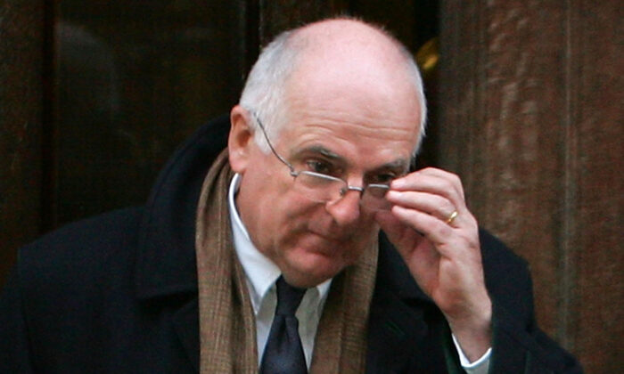 Sir Richard Dearlove, former head of MI6, leaves the High Court after giving testimony in an inquest in London, UK, on Feb. 20, 2008. (Cate Gillon/Getty Images)