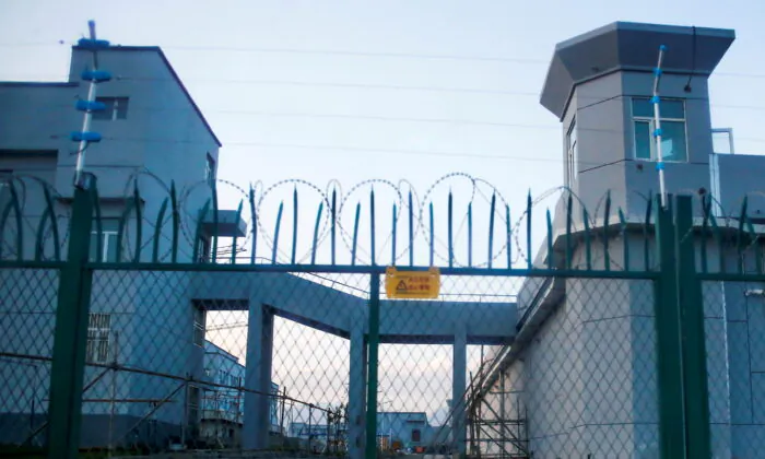 A perimeter fence surrounds a forced reeducation center in Dabancheng, Xinjiang region, China, on Sept. 4, 2018. (Thomas Peter/Reuters)