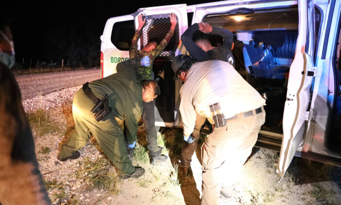 Border Patrol takes seven illegal aliens from Guatemala into custody near Brackettville, Texas, on May 25, 2021. (Charlotte Cuthbertson/The Epoch Times)