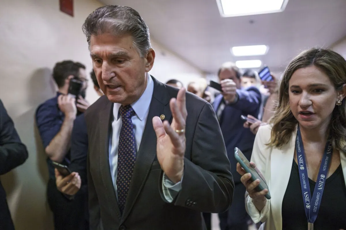 Sen. Joe Manchin (D-W.Va.) speaks to reporters on Capitol Hill in Washington on May 27, 2021. (J. Scott Applewhite/AP Photo)
