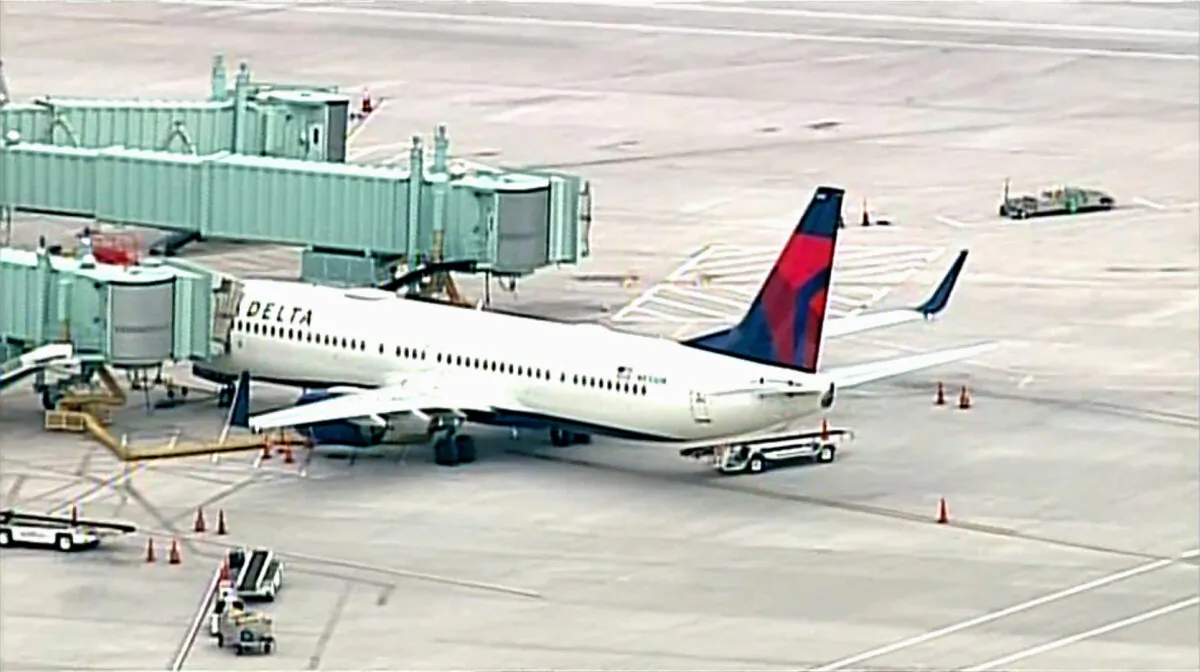 A Delta flight from Los Angeles International Airport bound for Nashville makes an emergency stop in Albuquerque, N.M., after a passenger attempted to breach the cockpit on June 4, 2021. (Courtesy of KOAT)
