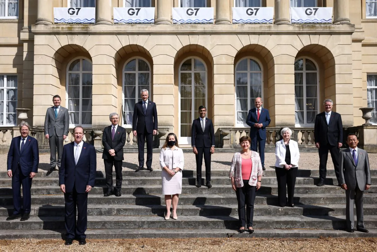 Finance ministers pose for a "family photo" during the G-7 meeting at Lancaster House in London, on June 5, 2021. (Henry Nicholls /Reuters)