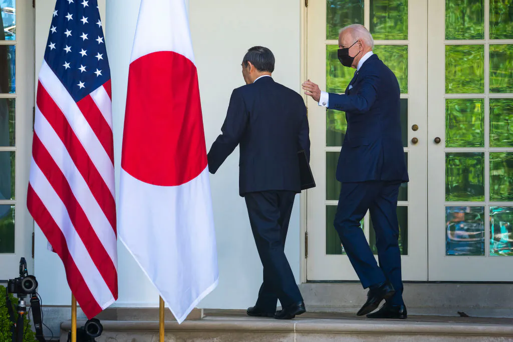 U.S. President Joe Biden (R) and Prime Minister Yoshihide Suga of Japan leave the Rose Garden at the conclusion of a news conference at the White House in Washington, DC. The two leaders met to discuss issues including China, human rights, supply chain resilience and other topics on April 16, 2021. (Doug Mills-Pool/Getty Images)