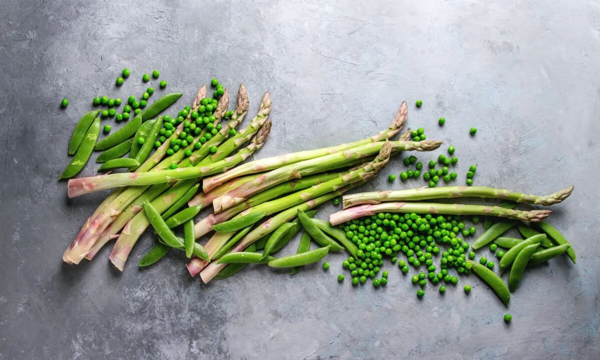 Asparagus and peas go together beautifully, but feel free to add your own favorites to this veggie medley. (Natasha Breen/shutterstock)
