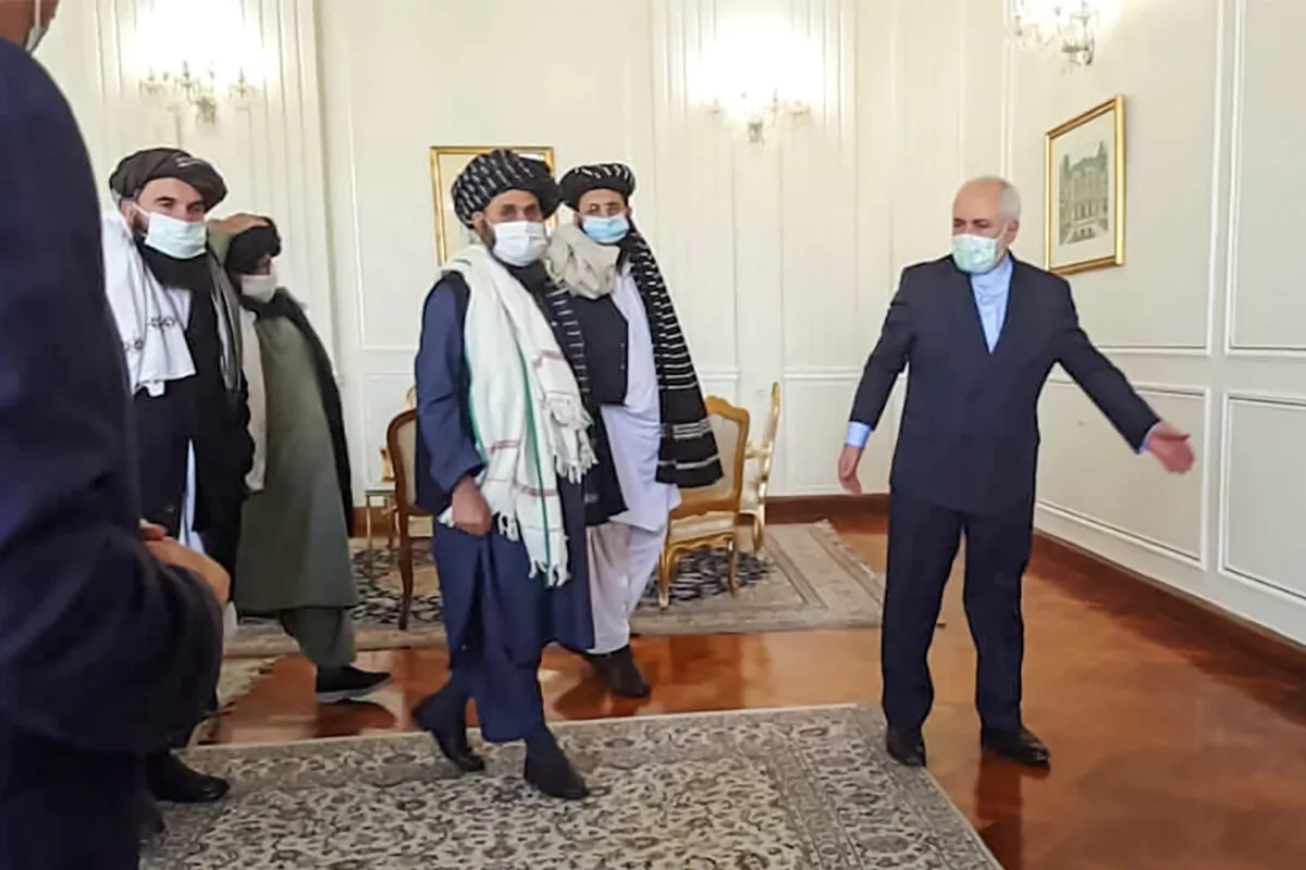 A picture obtained by AFP from the Iranian news agency Tasnim on Jan. 31, 2021, shows
Iran' Foreign Minister Mohammad Javad Zarif (R) meeting with Mullah Abdul Ghani Baradar (C-L) of the Taliban in Tehran. Iran's Foreign Minister Mohammad Javad Zarif called for the formation of an "all-inclusive" Afghan government during a meeting with a Taliban delegation in Tehran. (TASNIM NEWS/AFP via Getty Images)