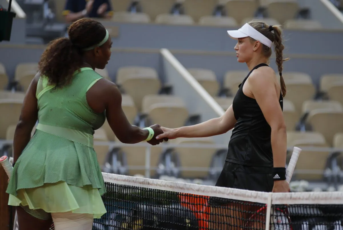 United States Serena Williams hands with Kazakhstan's Elena Rybakina after losing their fourth round match at the French Open tennis tournament at Roland Garros in Paris, France, on June 6, 2021. (Sarah Meyssonnier/Reuters)