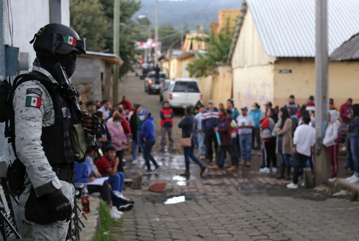 A member of the National Guard stands guard ahead of midterm elections in Nahuatzen, Mexico, on June 5, 2021. (Alan Ortega/Reuters)
